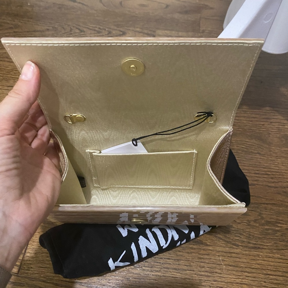 Kurt Geiger Elegant Cream Clutch with Gold Accent - Picture 2 of 2
